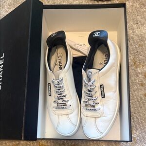 CHANEL White and Black Logo Sneakers